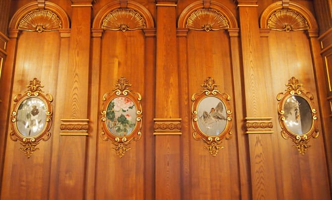 A photo of the cloisonné work inset in the walls of Kacho no Ma. From left, the cloisonné panels are in order of, 