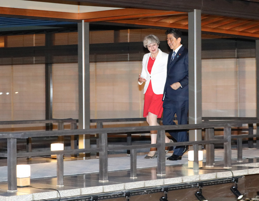 The Rt. Hon Theresa May MP, Prime Minister of the United Kingdom is walking across the Rokyo covered bridge with Prime Minister Shinzo Abe.