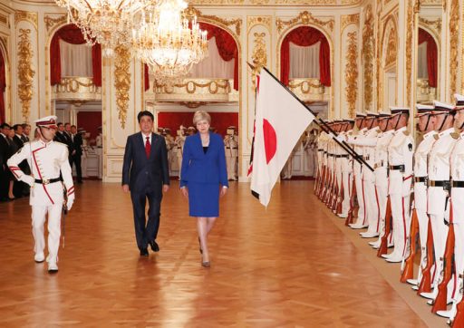 The Rt. Hon Theresa May MP, Prime Minister of the UK and the Prime Minister Abe walking in front of the Guards of Honour lead by the commander at the Welcome Ceremony in Hagoromo no Ma