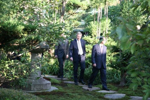 H.E. Mr. Christian Wulff, President of the Federal Republic of Germany strolling in the garden.