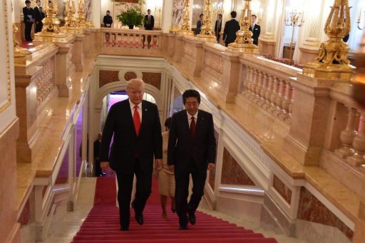 Prime Minister Abe and President Trump go up the main stairs for their Summit Meeting.